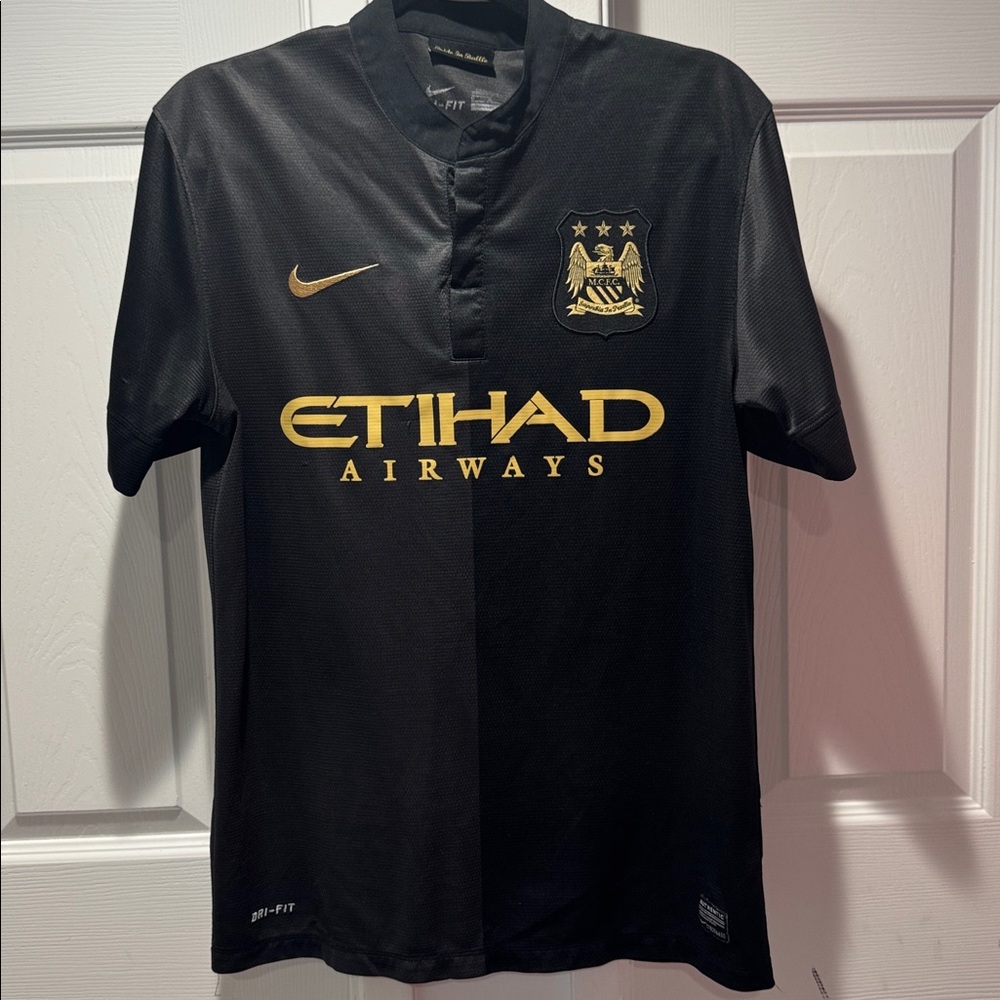 Nike Black Jersey with Gold Details